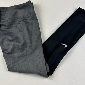 Gently Used Nike DRI FIT Fast pocket running Womens Tights heather/black  XL